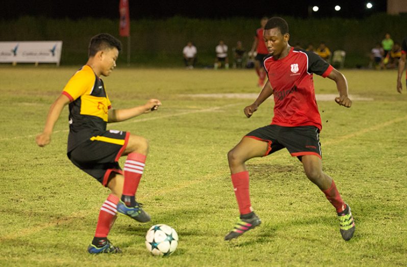 Annai Secondary (on the ball) proved too much for their opponents, Christianburg Wismar Secondary School (CWSS). (Delano Williams photo)