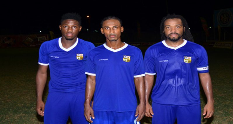 Alpha United goalscorers strike a pose after their 5-0 win against GFC. From left are Colric Beckles, Gregory `Jackie Chan’ Richardson and Konata Manning.