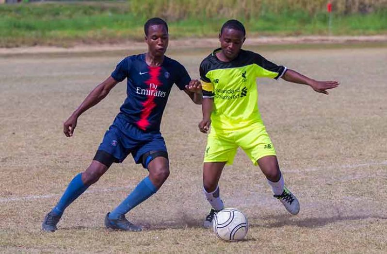 Annandale (blue and red) steamrolled Charlestown Secondary 4-0 in their quarter-final match (Delano Williams photo)