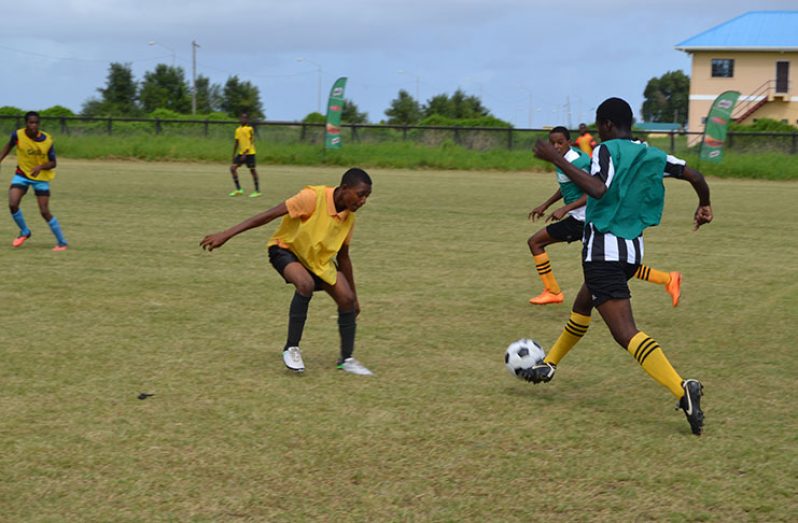 Flashback! Action last week in the MoPH/Milo schools U-18 Football tournament. (Stephan Sookram photo)
