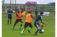 Part of the action in the ExxonMobil u14 Boys and Girls Schools football
