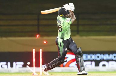 Carlos Brathwaite of Lahore Qalandars is bowled by Zak Chappell of Rangpur Riders during the ExxonMobil Guyana Global Super League T20 match between Lahore Qalandars and Rangpur Riders at Providence Stadium on December 05, 2024 in Georgetown, Guyana. (Photo by Ashley Allen - GSLT20/Global Super League via Getty Images)