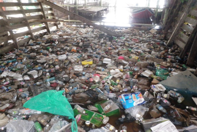 Garbage that has been dumped into the Pomeroon River