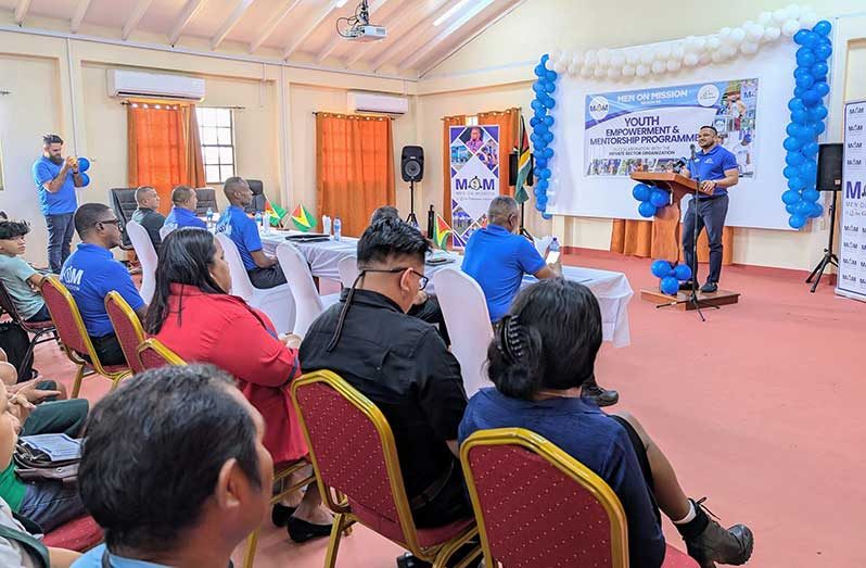Minister of Natural Resources, Vickram Bharrat, addressing the gathering of the Youth Empowerment and Mentorship Programme, held in collaboration with Men On Mission and the Private Sector Commission.