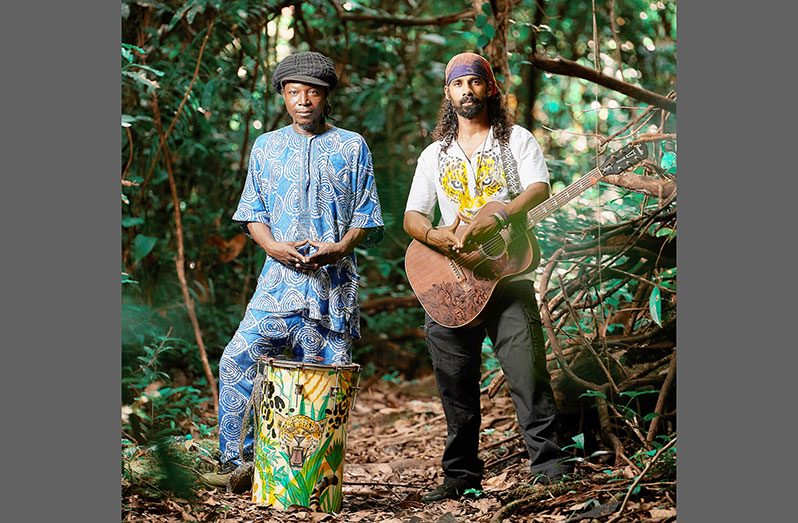 Local folk/rock musician Gavin Aaron Mendonca (right) has teamed up with Leader of the Buxton Fusion Drumming Group, Marlon ‘Chucky’ Adams