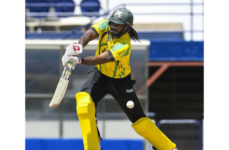 ON THE GO: Jamaican opener Chris Gayle drives during his 122 against Barbados Pride at Kensington Oval on Saturday. (Photo courtesy CWI Media)