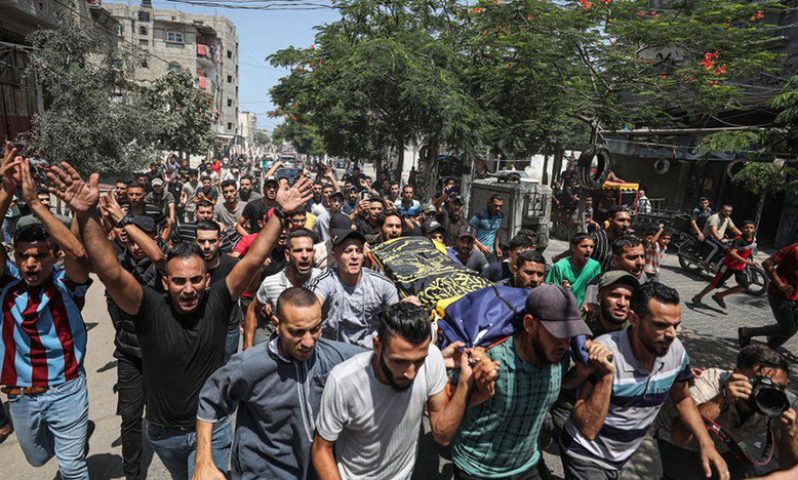 People attend the funeral ceremony of Palestinians, who lost their lives in Israel's attacks, in Rafah, Gaza on August 07, 2022 (ANADOLU AGENCY VIA GETTY/BBC photo)
