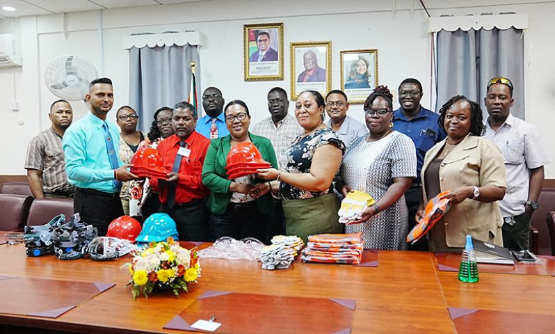 Deputy Chief Education Officer (Technical), Dr. Ritesh Tularam handing over the items to teachers of the TVET schools