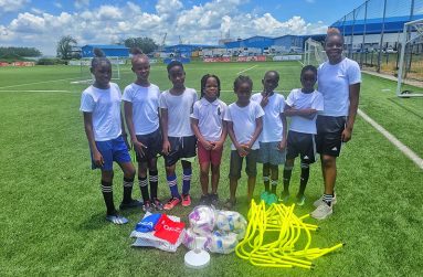 Fruta Conquerers members receiving their donation of football gear from the GFF- 
Members Financial Assistance Programme