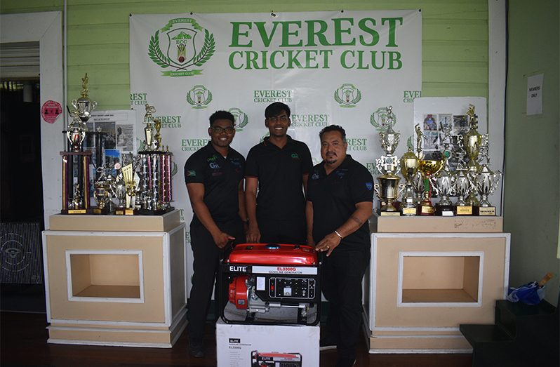 Ronaldo McGarrell (left), Anthony Khan (centre) and John Ramsingh at the handing over of the generator at the Everest Cricket Club