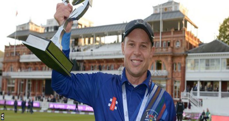 Geraint Jones holds the trophy after the final match of his county career.
