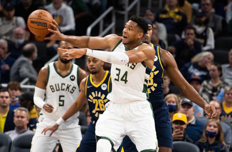 Milwaukee Bucks forward Giannis Antetokounmpo (34) passes the ball in the second half against Indiana Pacers at Gainbridge Fieldhouse (Mandatory Credit: Trevor Ruszkowski-USA TODAY Sports)