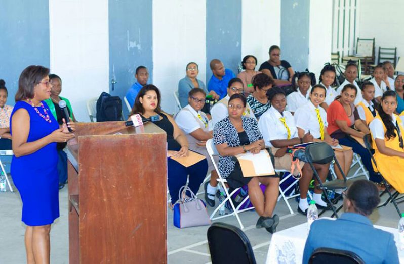 Minister of Public Telecommunications, Catherine Hughes, speaks to girls at the North Ruimveldt Multilateral School as Guyana observed ‘Girls in ICT’ day