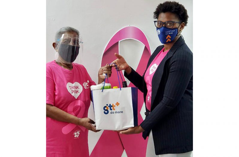 Cancer Survivor: Nurse Singh receives a care package from GTT’s Pinktober Coordinator, Diana Gittens