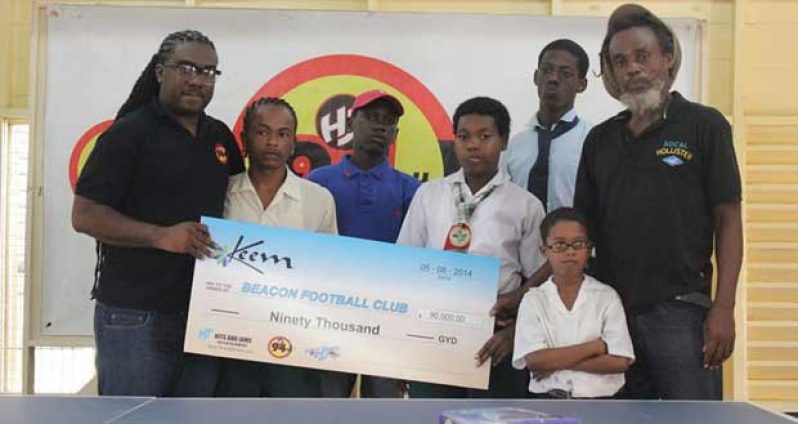 HJTV’s Rawle Ferguson (far left in photos) making the various handovers that came as a spring off from the HJ ‘Day of Sports’ event