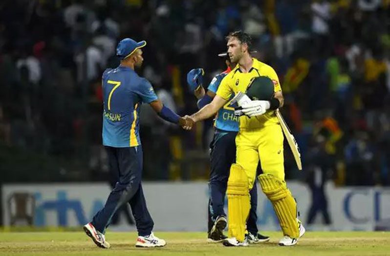 Glenn Maxwell being congratulated after victory was achieved..