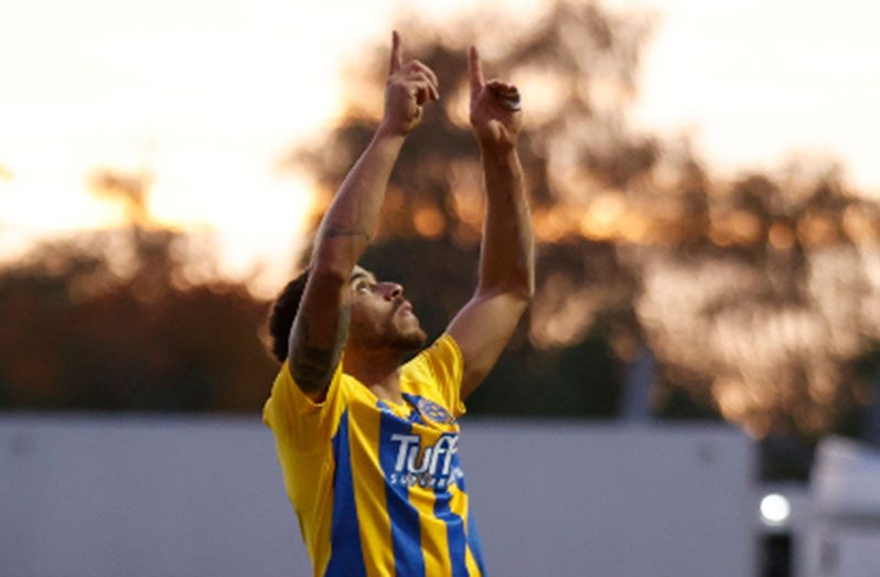 Elliott Bennett celebrates his goal for Shrewsbury Town on Sunday.