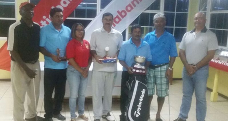 The day’s winners pose with Marketing Manager Jennifer Cipriani (2nd from left) and Club President Oncar Ramroop (far right). From left are; Kalyan Tewari, Rabindranath Persaud, Mike Mangal, and Hilbert Shields.