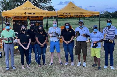 The winners of Saturday’s 18-hole golf tournament with representatives of Crown Mining