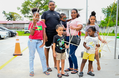 Amy Gonsalves and her family at Leopold Street’s kite-making workshop (Elton John photo)
