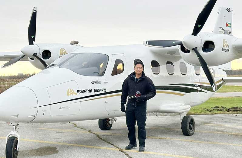 Roraima Airways Director of Aviation and Chief Pilot Gerald Gouveia Jr standing in front of the newly-acquired Tecnam P2012 aircraft