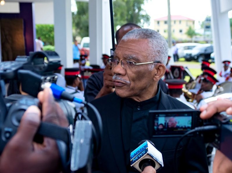 President David Granger speaks with members of the media Monday at the Mausoleum, Place of Heroes, Seven Ponds, Botanical Gardens (Delano Williams)