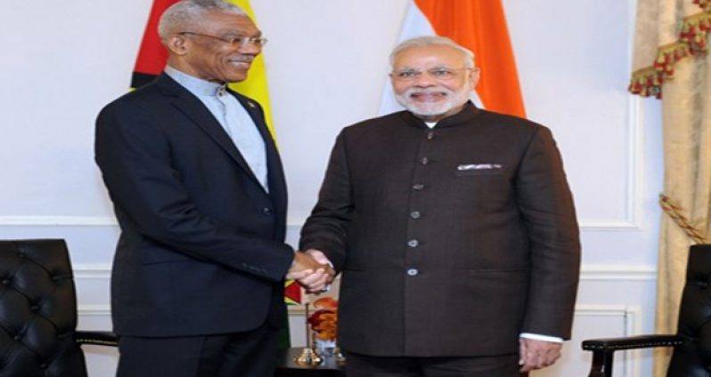 President David Granger greets the Prime Minister of India Narendra Damodardas Modi, during a meeting in New York, on Thursday. Both leaders are in New York to attend the 70th United Nations General Assembly