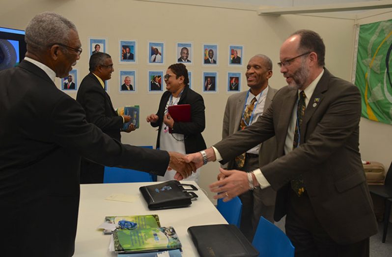 President David Granger and Ambassador Irwin LaRocque greet each other at their meeting on Wednesday