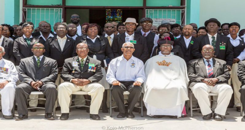 Opposition Leader Brigadier (rtd) David Granger with members of the Guyana Legion