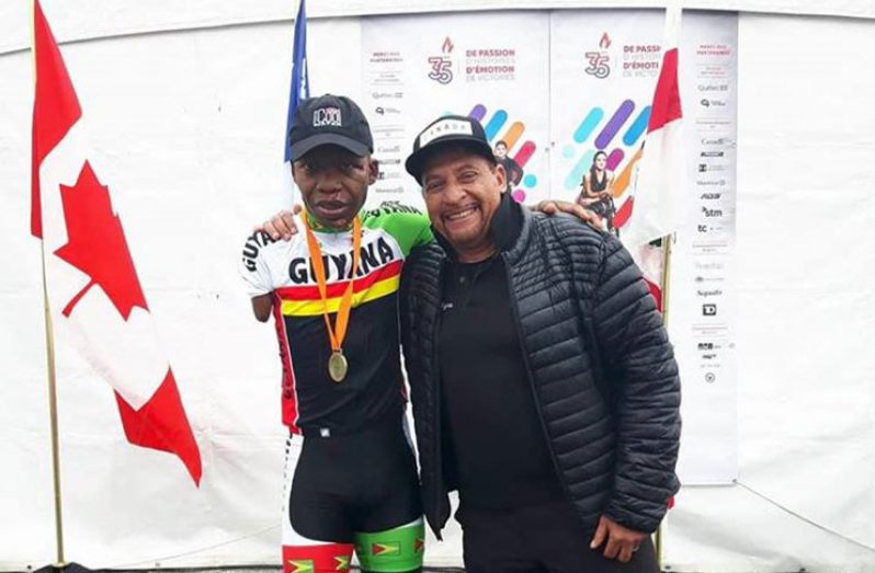 Grant Stuart (left) and his coach Wayne Henry after Sunday’s time trial in Canada