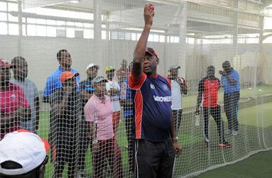 Former West Indies fast bowler, Tony Gray, demonstrates during yesterday’s session. (WICB Media/Randy Brooks)
