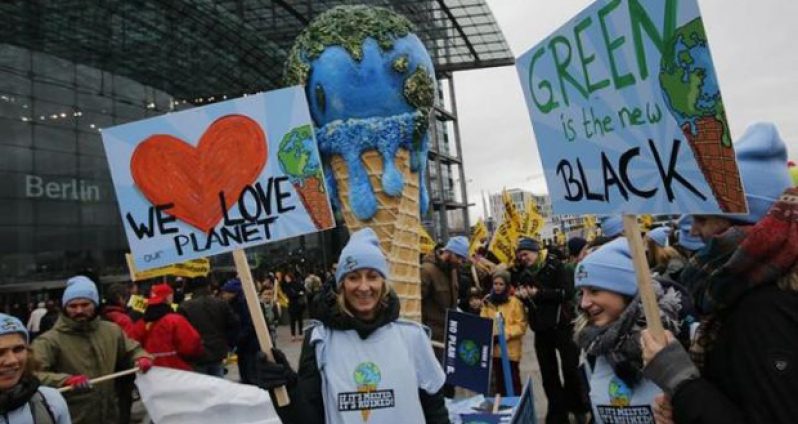 Protesters demonstrate during a rally ahead of the 2015 Paris Climate Conference, known as the COP21 summit, in Berlin, Germany on November 29, 2015. (Reuters/Fabrizio Bensch photo)