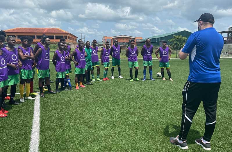 GFF Technical Director, Ian Greenwood, addresses players at the U-20 talent ID session.