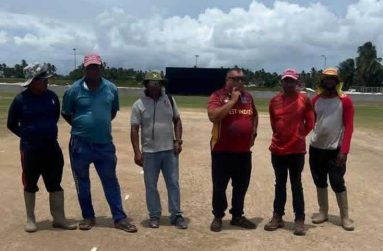 Raj Singh, third from  right, with the ground staff