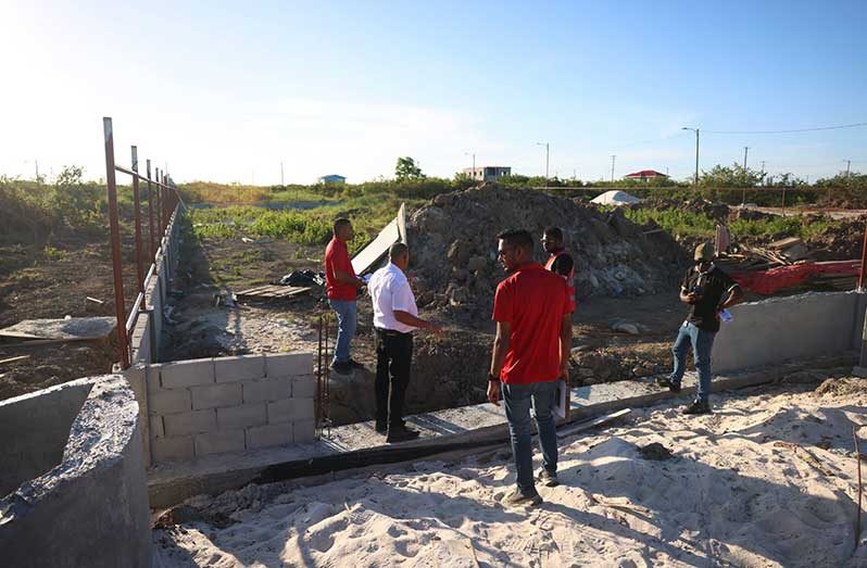 Minister of Housing, Collin Croal and team during a visit to the recreational facility under development at Le Reconnaissance on the East Coast of Demerara