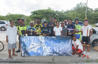 Respective category winners of the 19th Diamond Mineral Water 46-Miler pose with their trophies and representatives of DDL.