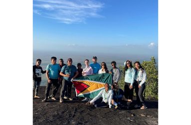 Touring Guyana owner, Shavana Goulchand, with a group of tourists on top of the 3,500 feet Schomburgk’s Peak in the Kanuku mountains