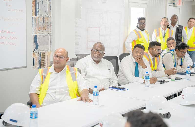 Prime Minister, Brigadier (Ret’d) Mark Phillips and Minister of Public Utilities and Aviation, Deodat Indar, during the briefing on Monday