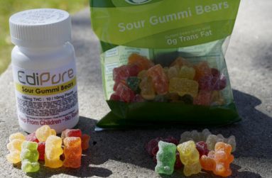 Marijuana-infused sour gummy bear candies (L) are shown next to regular ones at right in a photo illustration near to where they were purchased in Northglenn, Colorado in this October 16, 2014 file photo. (REUTERS/Rick Wilking)