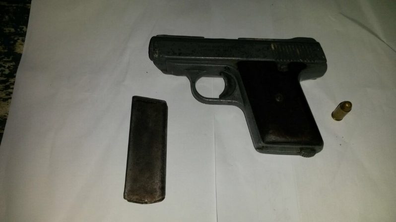 The unlicensed .32 pistol with two live matching rounds that were found