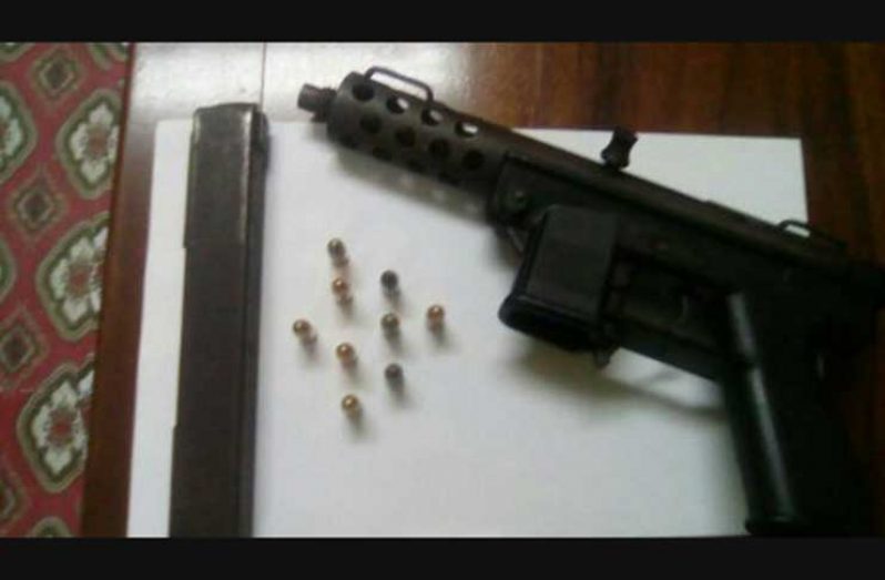 The illegal gun and ammo abandoned by the suspects