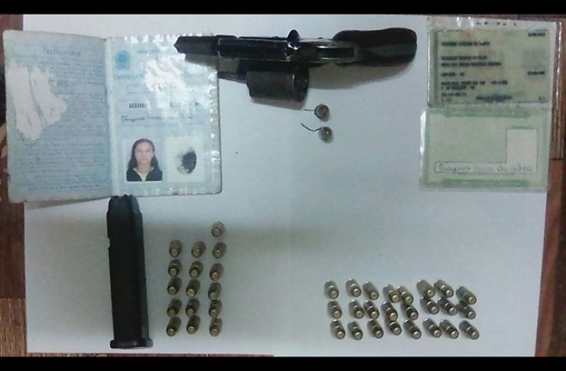 The .38 revolver, 9mm magazine and forty-two live rounds of ammunition that were found along with Brazilian documents.