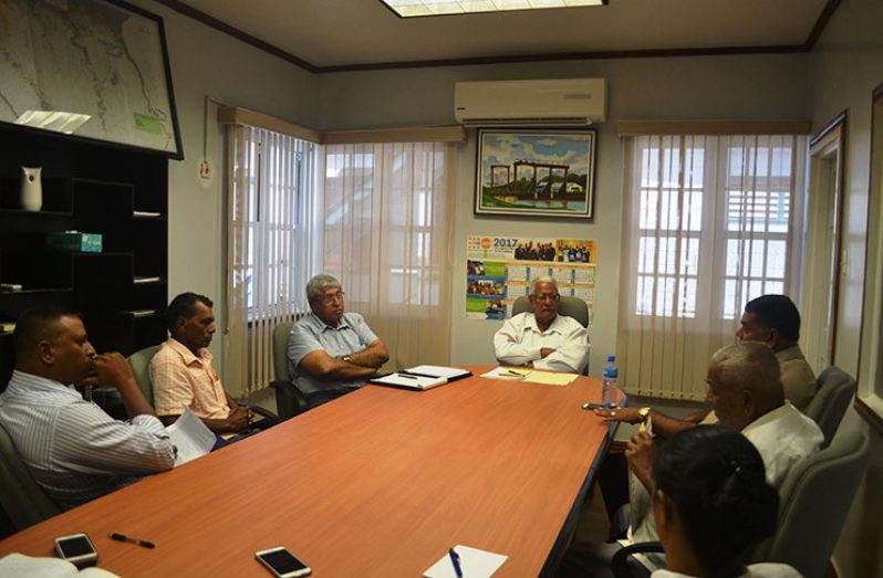 Agriculture Minister Noel Holder (centre) in discussion with members of the East Berbice Development Association