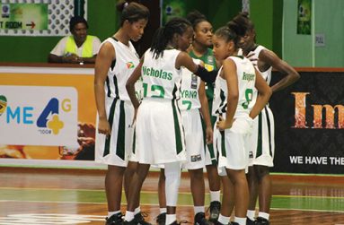 Huddled together the  Guyana girls talking it over after their heavy loss to BVI last night..