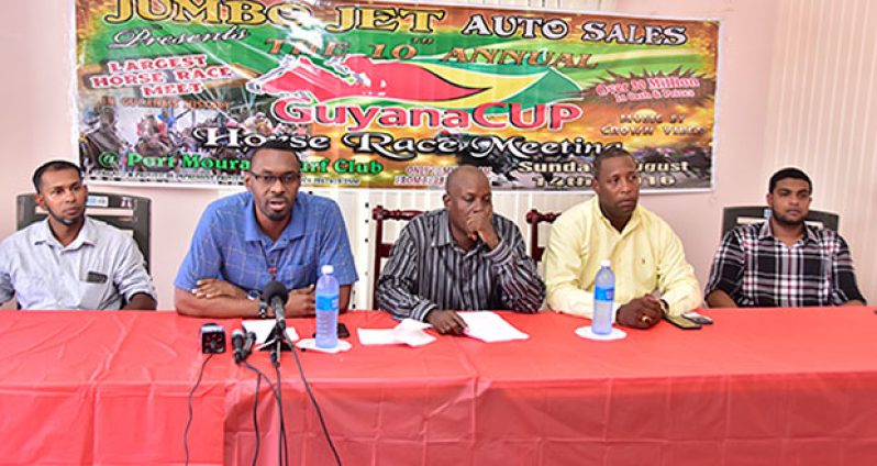 Director of Sport Christopher Jones (second left) during his remarks at the official launching of the 10th annual Guyana Cup. Also at the head table are: Chief coordinator Nazrudeen Mohammed Jr, Banks DIH Outdoor Events Manager Mortimer Stewart, Compton Sancho and Irshad Mohamed. (Adrian Narine photo)