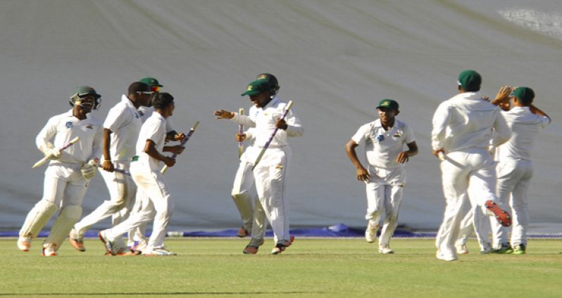The Guyana Jaguars celebrate after their innings-and-54-run victory against the Jamaica Scorpions on Sunday.