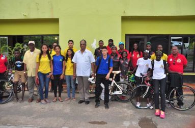 Director of Sport Neil Kumar and some of Guyana’s representatives at the IGG in Suriname upon arrival yesterday. (Rawle Toney photo)