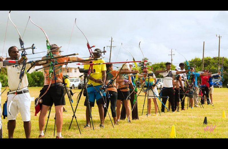 Archery Guyana’s Dwayne Grovesnor (first from left) in action in Barbados