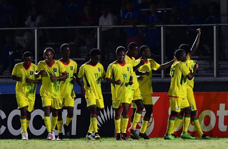 Guyana celebrating their 2-0 win over EL Salvador which was the team's only vicrory in fice putings at the CONCACAF U20 Championship. 

 