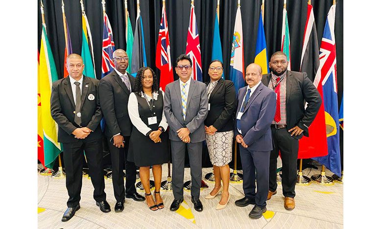 (From left) Fazil Karimbaksh - Head of the Special Organised Crime Unit (SOCU); Matthew Langevine, Director of the Financial Intelligence Unit (FIU); Natasha Backer – Assistant Director of Public Prosecutions; Mohabir Anil Nandlall, Attorney General and Minister of Legal Affairs; Alicia Williams Head of Compliance -FIU; Dr. Gobind Ganga, Governor of the Central Bank and Rommel St Hill, Anti Money Laundering/Caribbean Financial Task Force (AML/CFT) Officer in the Attorney General’s Office